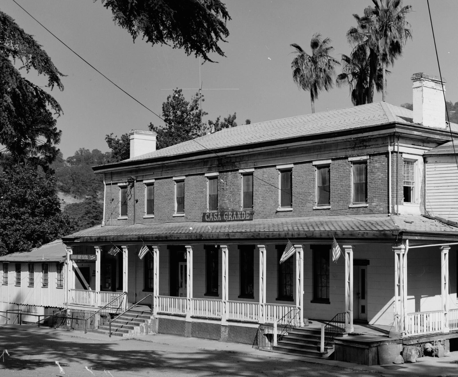 The two-story Casa Grande in New Almaden with its long front porch