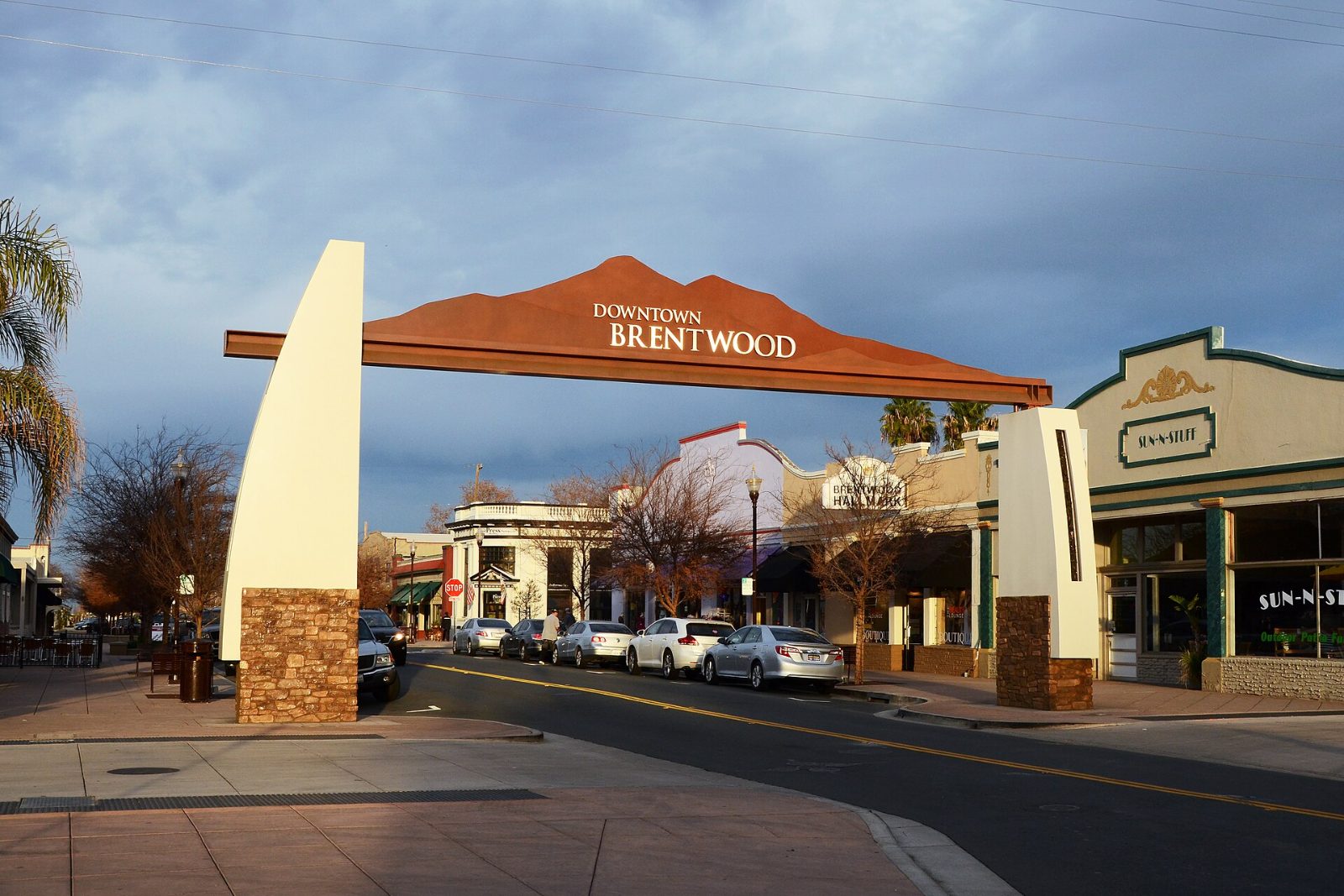 The arched gateway sign over the street into downtown Brentwood