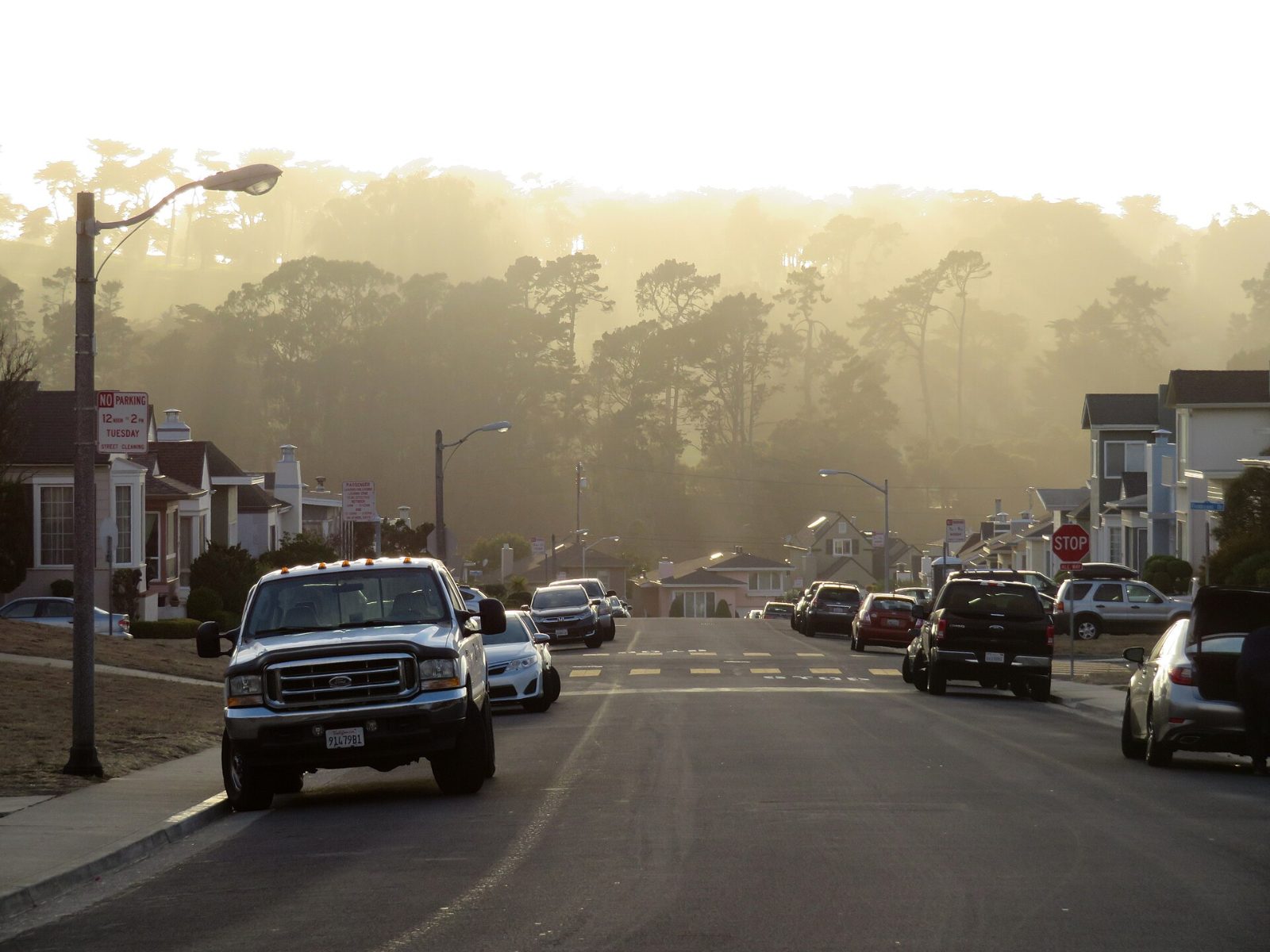 Fog rolling over the homes and hills of Daly City