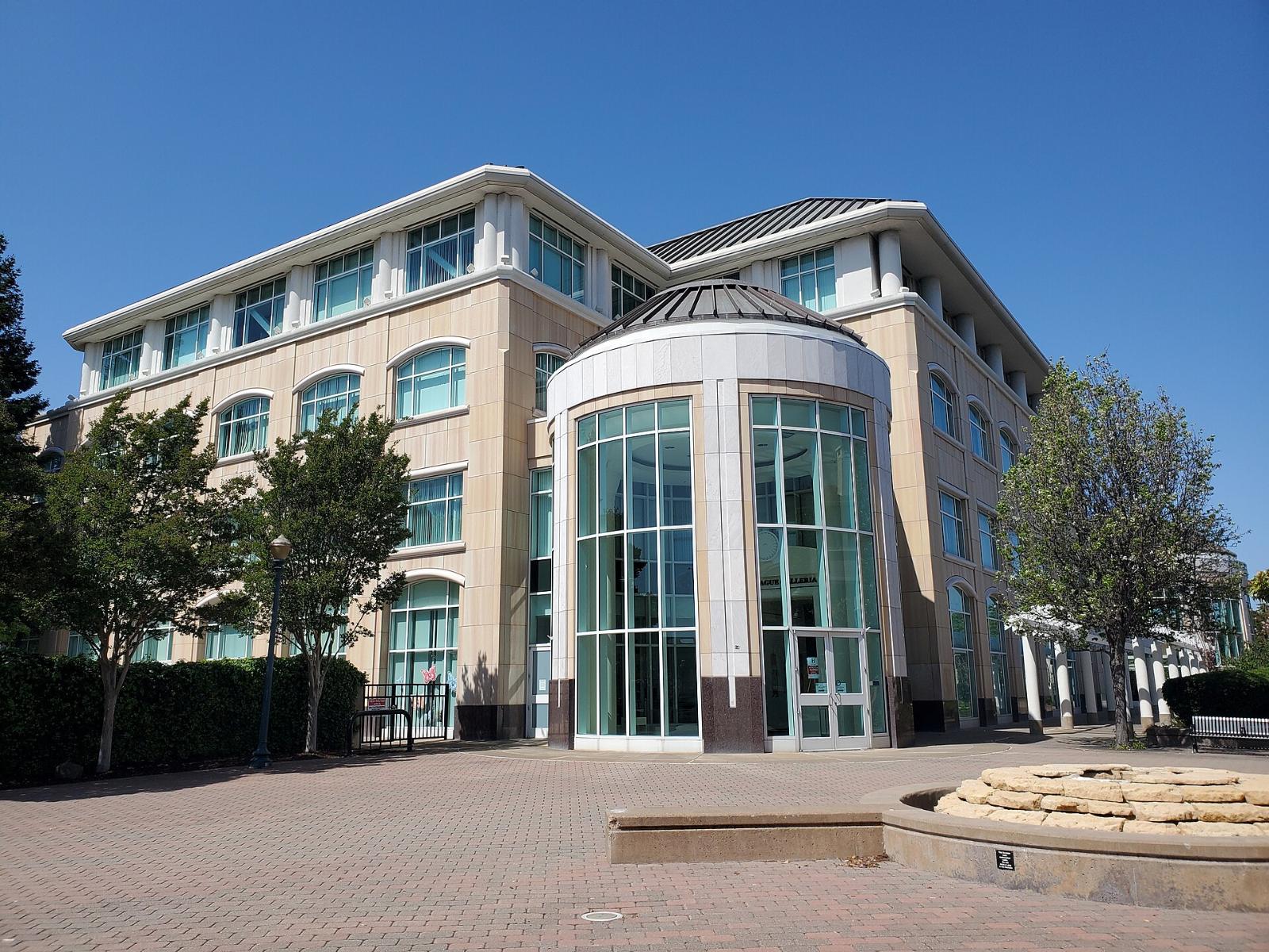 Hayward City Hall with its rounded glass entrance and plaza