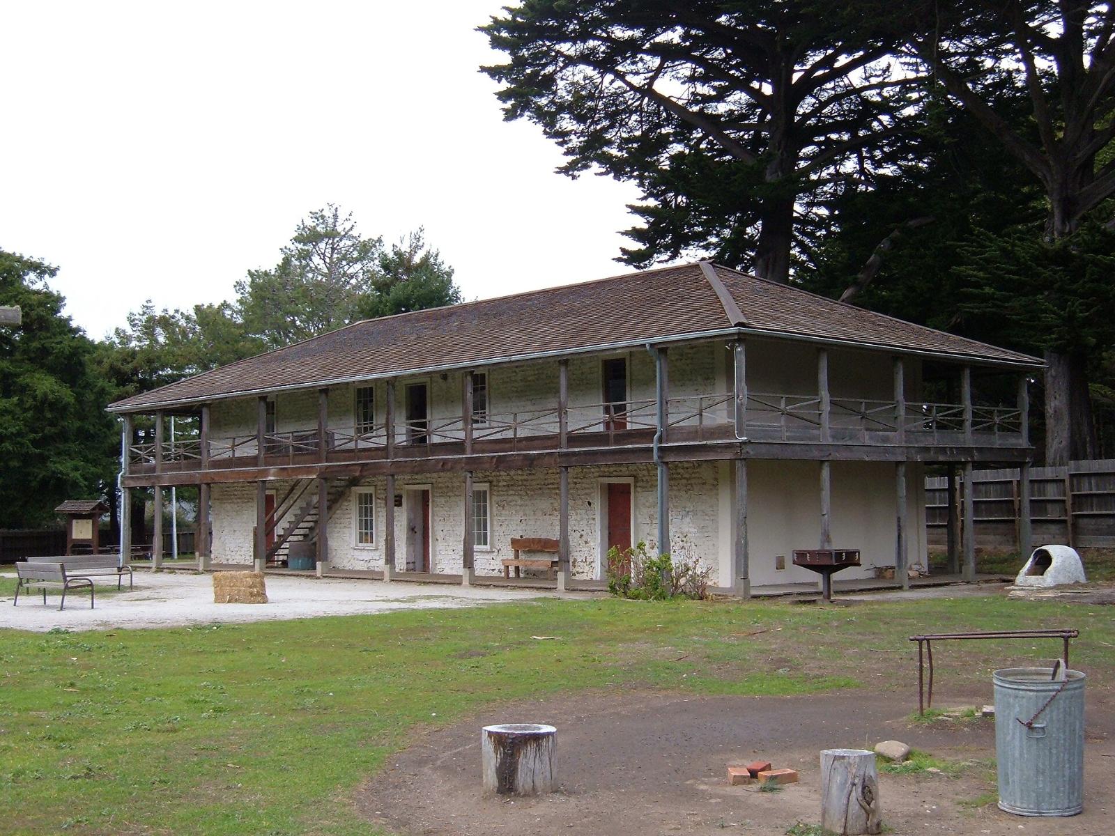 The two-story Sánchez Adobe with its wooden veranda in Linda Mar, Pacifica