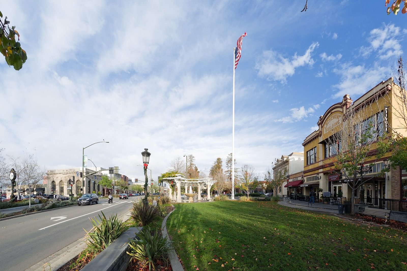 First Street in downtown Livermore with storefronts and a landscaped median