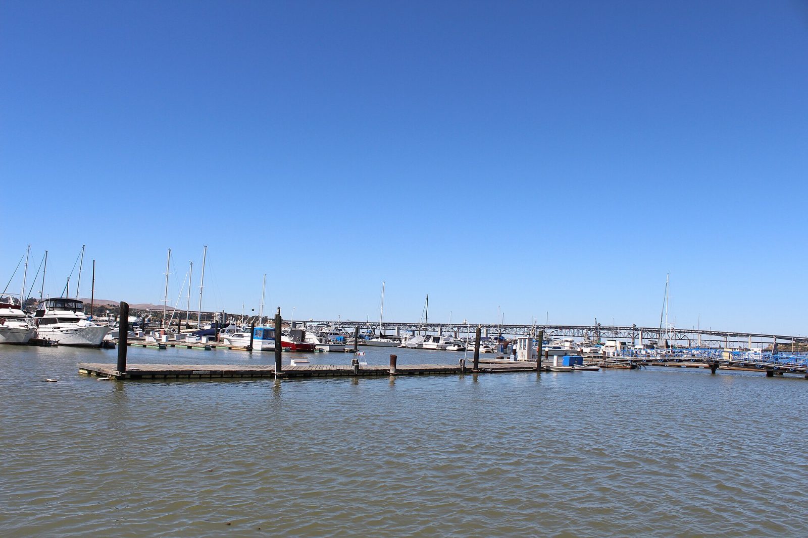 Boats in the Martinez marina with the Benicia–Martinez Bridge behind