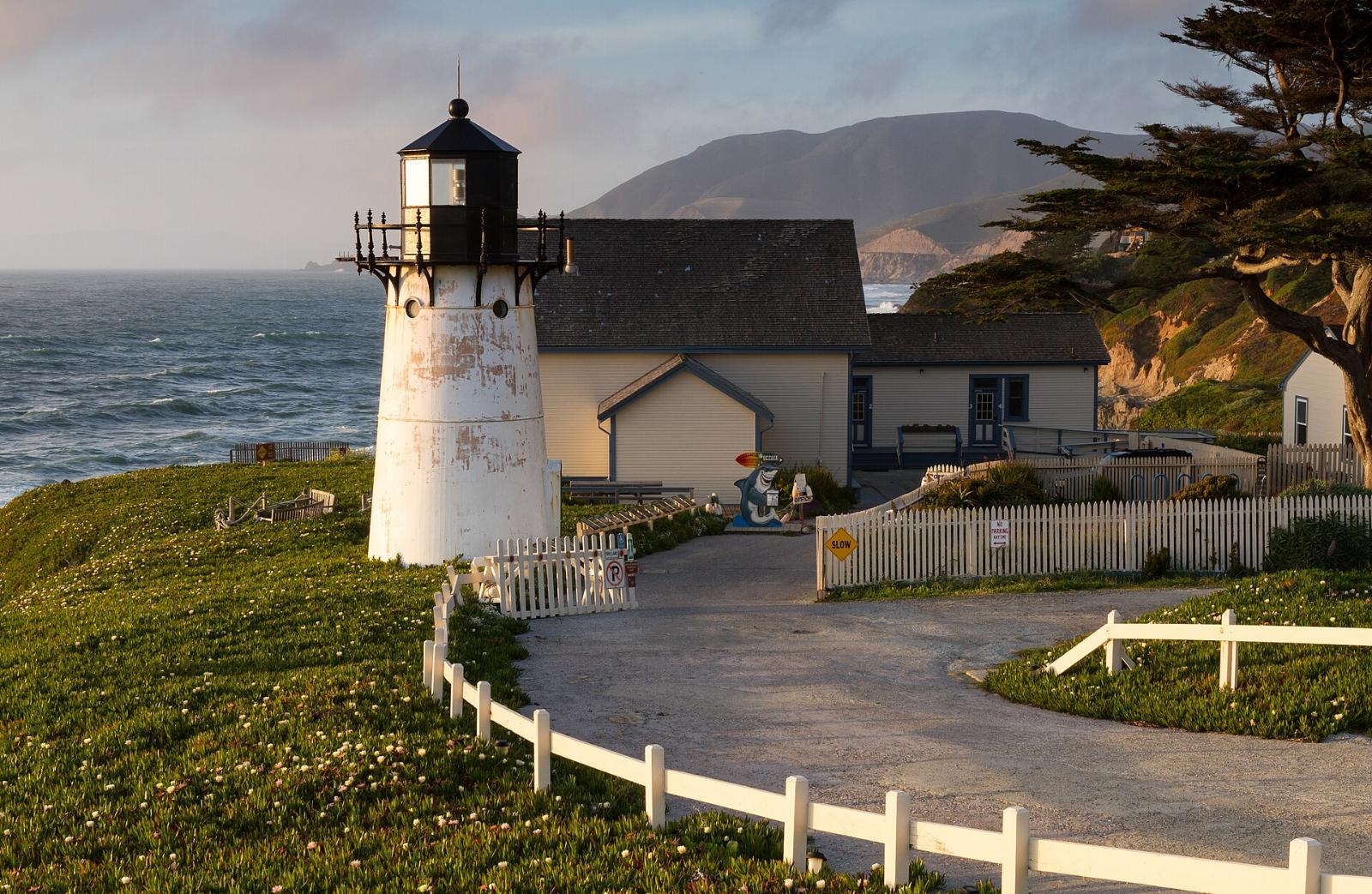 The white Point Montara Lighthouse above the ocean in Montara