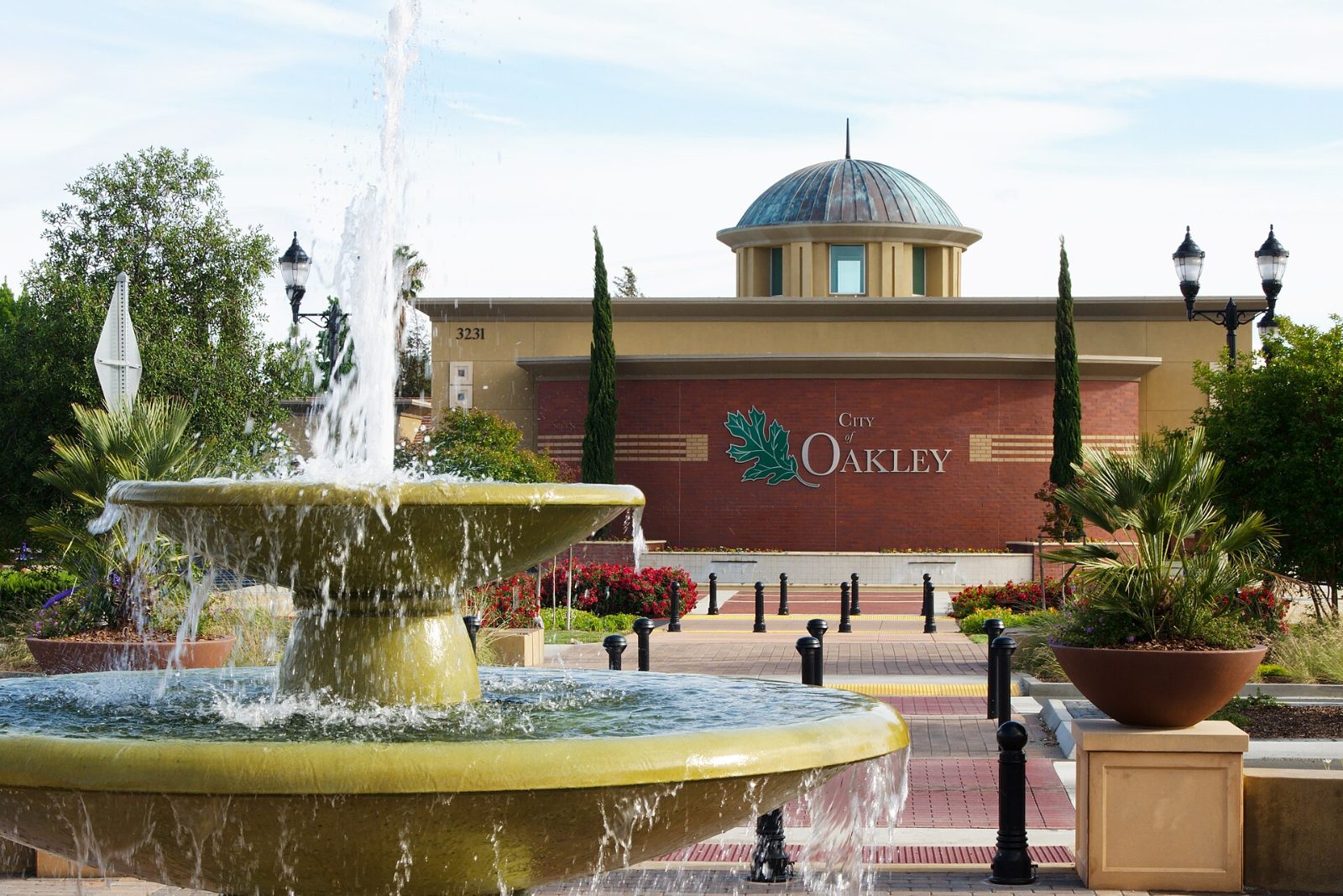 Oakley City Hall with a fountain in front