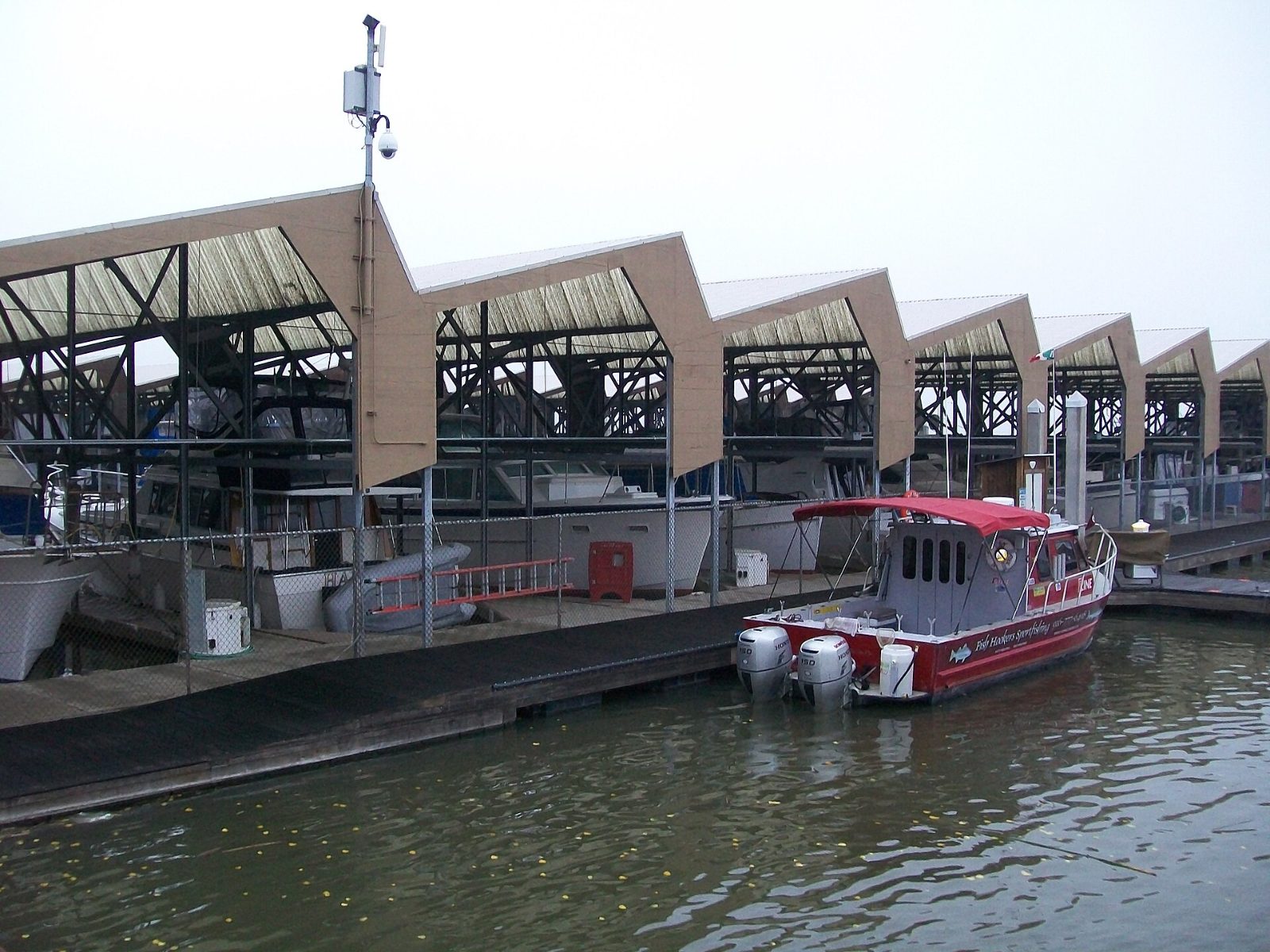 Boats docked at the Pittsburg Marina on the river