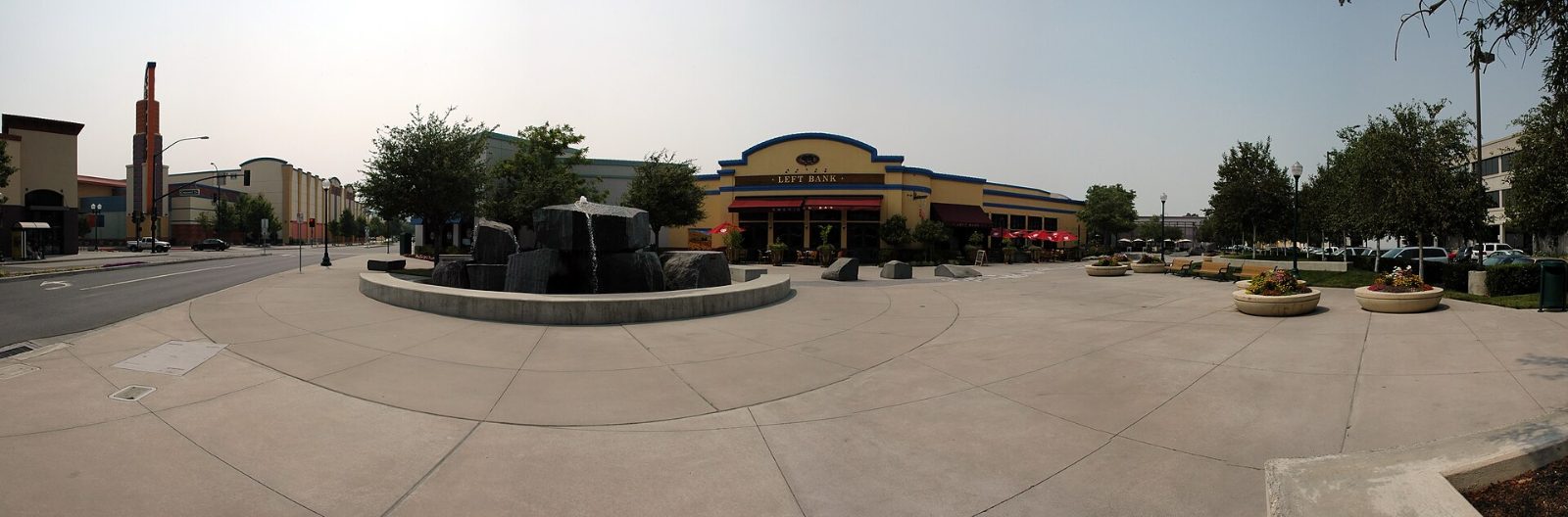 A wide view of the shops and plaza of Downtown Pleasant Hill
