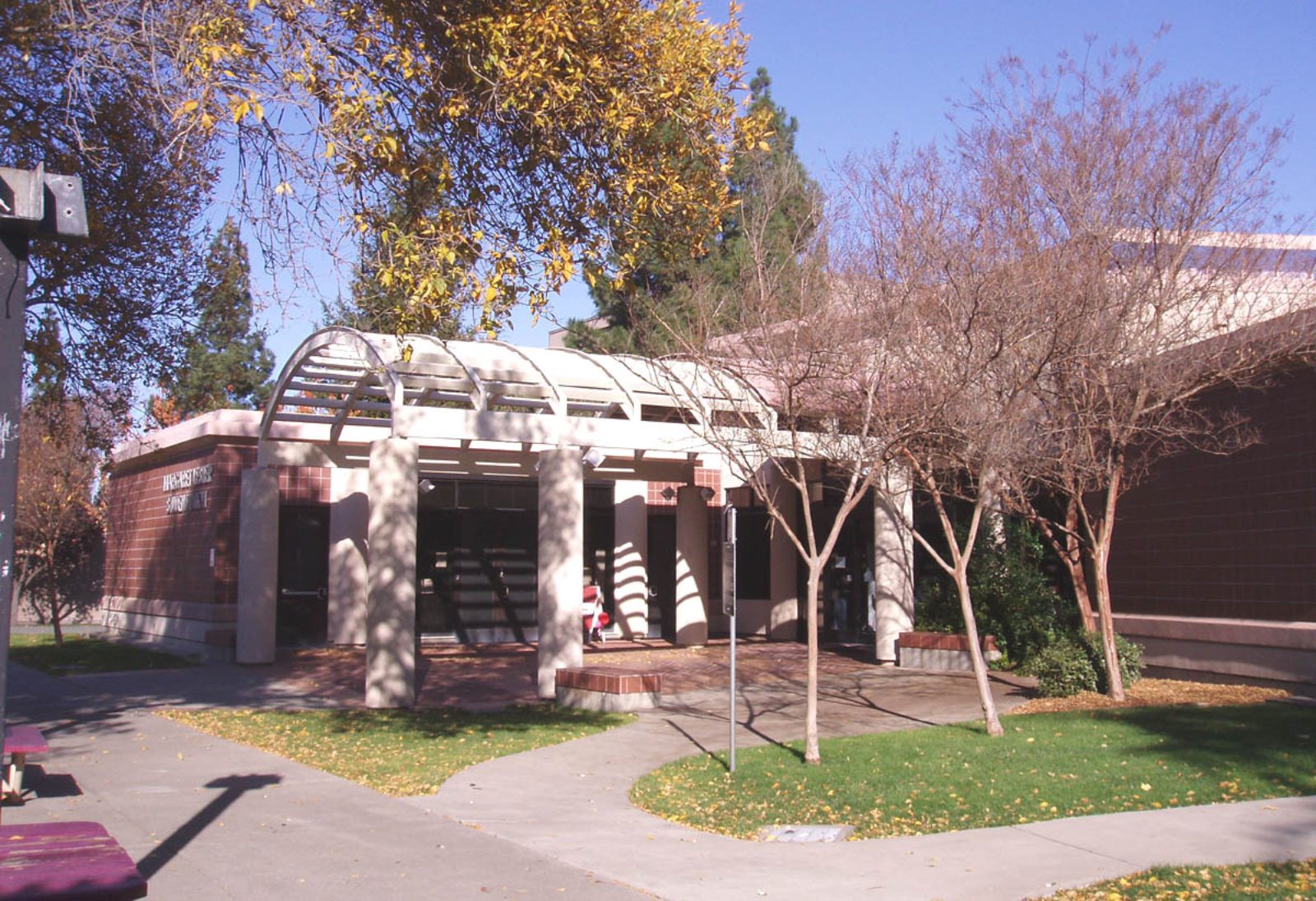 The Student Union building at Diablo Valley College with trees in autumn colors