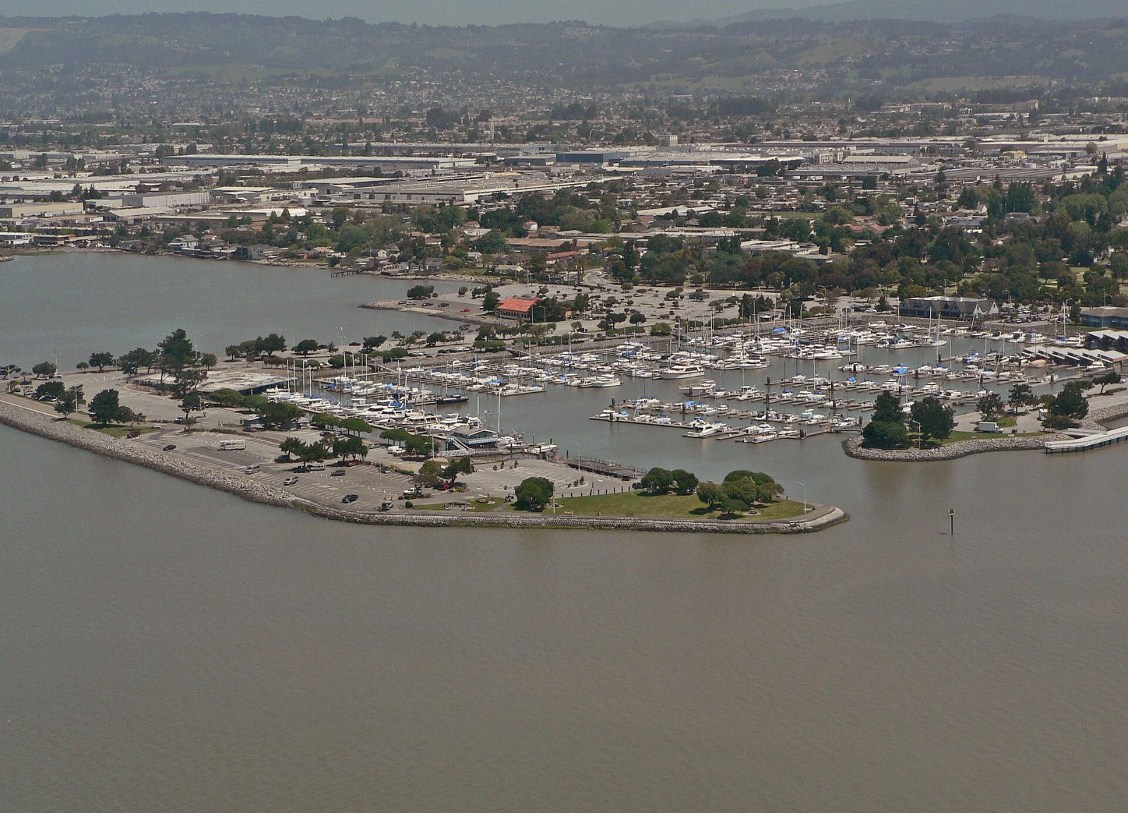 Boats in the San Leandro Marina with the East Bay hills behind