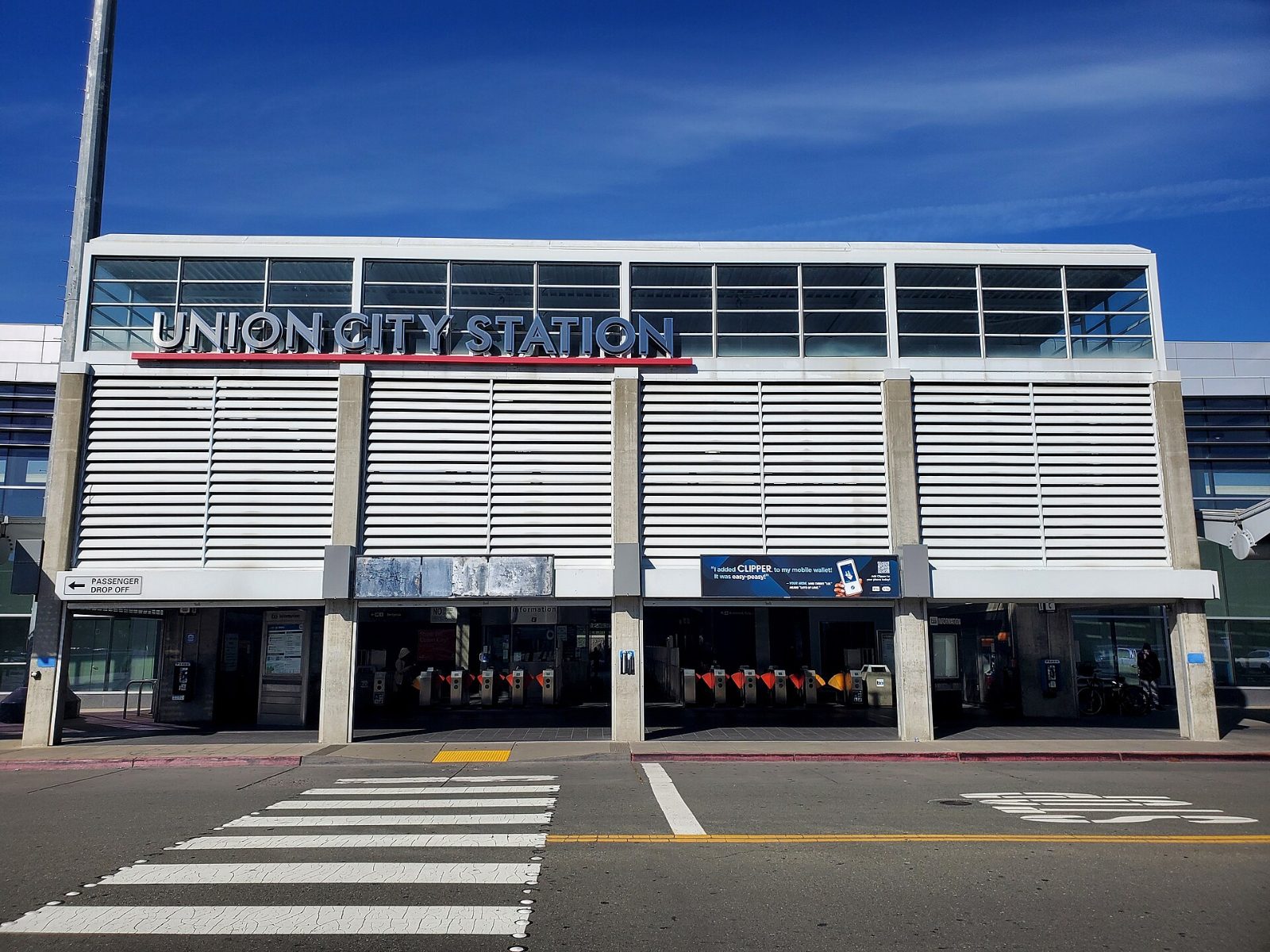 The main entrance of the Union City BART station on a sunny day