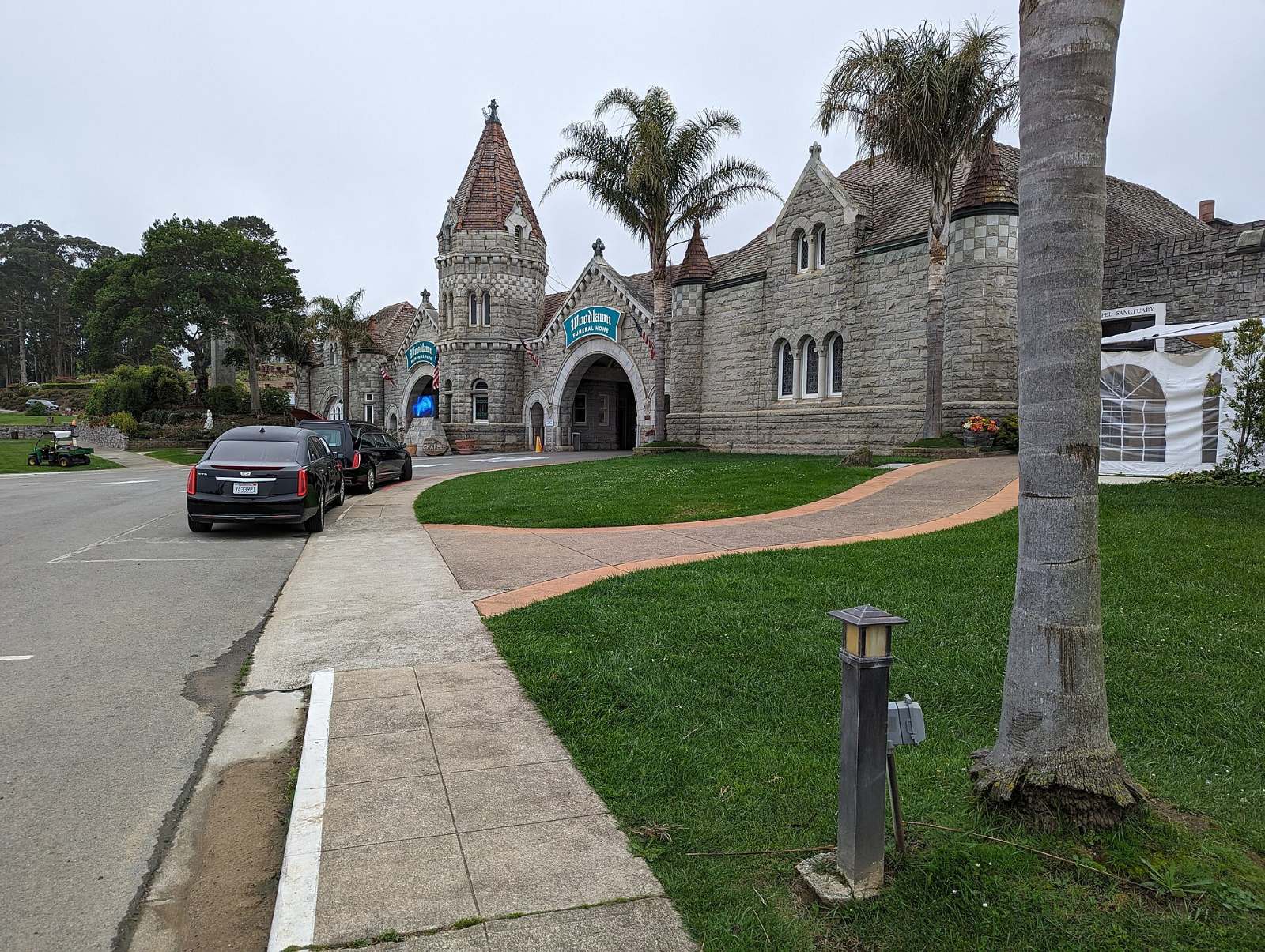 The stone chapel and entrance drive at Woodlawn Memorial Park in Colma