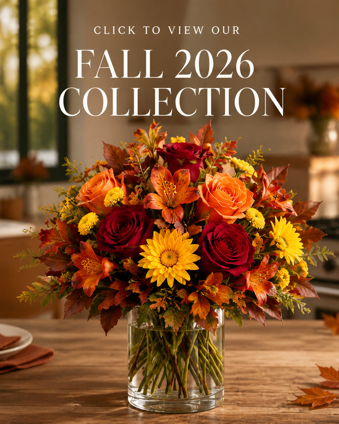 Fall 2026 Collection arrangement with orange lilies, red and orange roses, yellow flowers, and autumn foliage